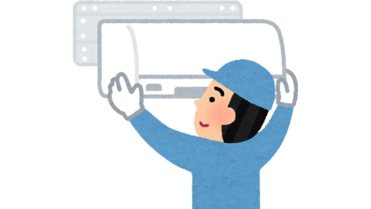 エアコン掃除を始めようとしている作業員さん